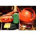 A selection of plastic watering cans, petrol cans, water hose, garden knee rest etc. Not available