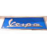 Chrome Vespa sign, 43 x 14 cm. P&P Group 1 (£14+VAT for the first lot and £1+VAT for subsequent