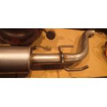 Stainless steel exhaust. Not available for in-house P&P, contact Paul O'Hea at Mailboxes on 01925