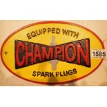 Cast iron Champion Spark Plugs wall sign, L: 28 cm. P&P Group 1 (£14+VAT for the first lot and £1+