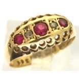 18ct gold ring set with three rubies and two diamonds, size M/N, 2.2g. P&P Group 1 (£14+VAT for