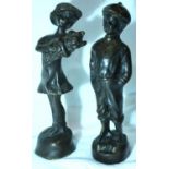 Pair of bronze figurines of a boy and girl, H: 20 cm. P&P Group 2 (£18+VAT for the first lot and £