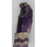 Good quality amethyst carving of a toad on a column, probably a seal top, H: 50 mm. P&P Group 1 (£