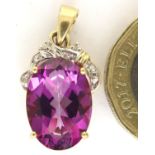 9ct gold topaz and diamond pendant. Pendant drop 18 mm, 2.9g. P&P Group 1 (£14+VAT for the first lot