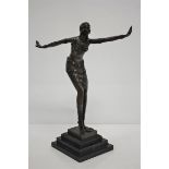 A MODERN ART DECO STYLE BRONZE FUGURE OF A DANCER WITH OUT STRETCHED ARMS, 42CM HIGH