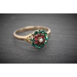 *VINTAGE GREEN AND RED STONE SET RING WITH SEED PEARL (ONE GREEN STONE MISSING )