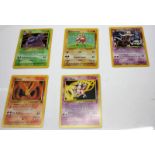 X5 MIXED ORIGINAL SERIES POKEMON CARDS THAT INCLUDE HITMONCHAN, FOSSIL SET MUK, FOSSIL SET