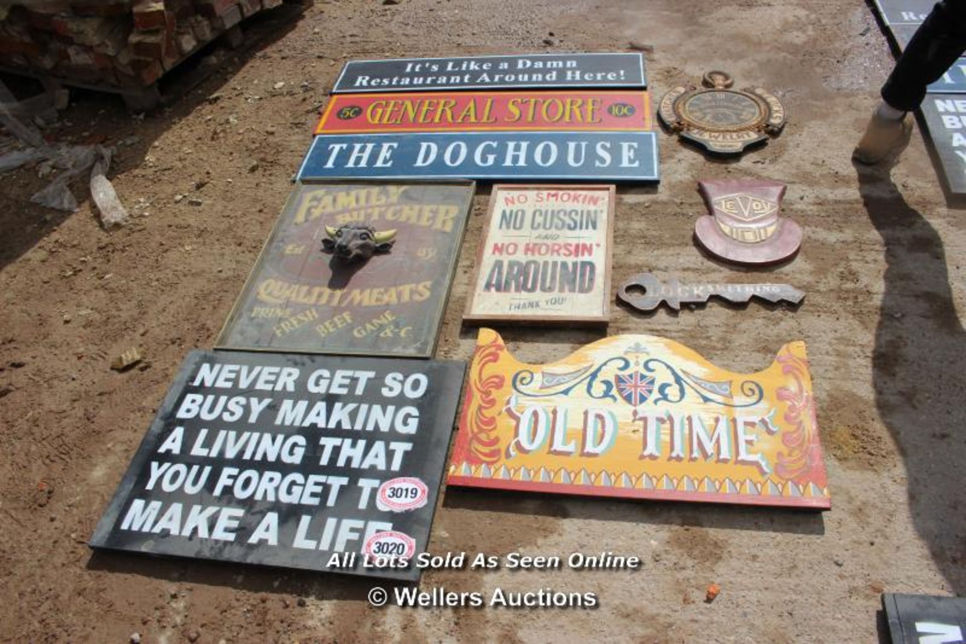 *TEN VARIOUS WOODEN SIGNS INCLUDING 'THE FAMILY BUTCHER' AND 'THE DOGHOUSE'