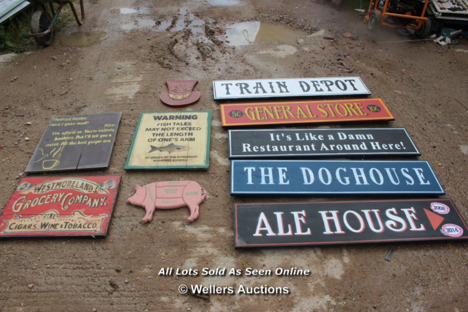 *TEN VARIOUS WOODEN SIGNS INCLUDING 'TRAIN DEPOT' AND 'GROCERY COMPANY AND MORE'