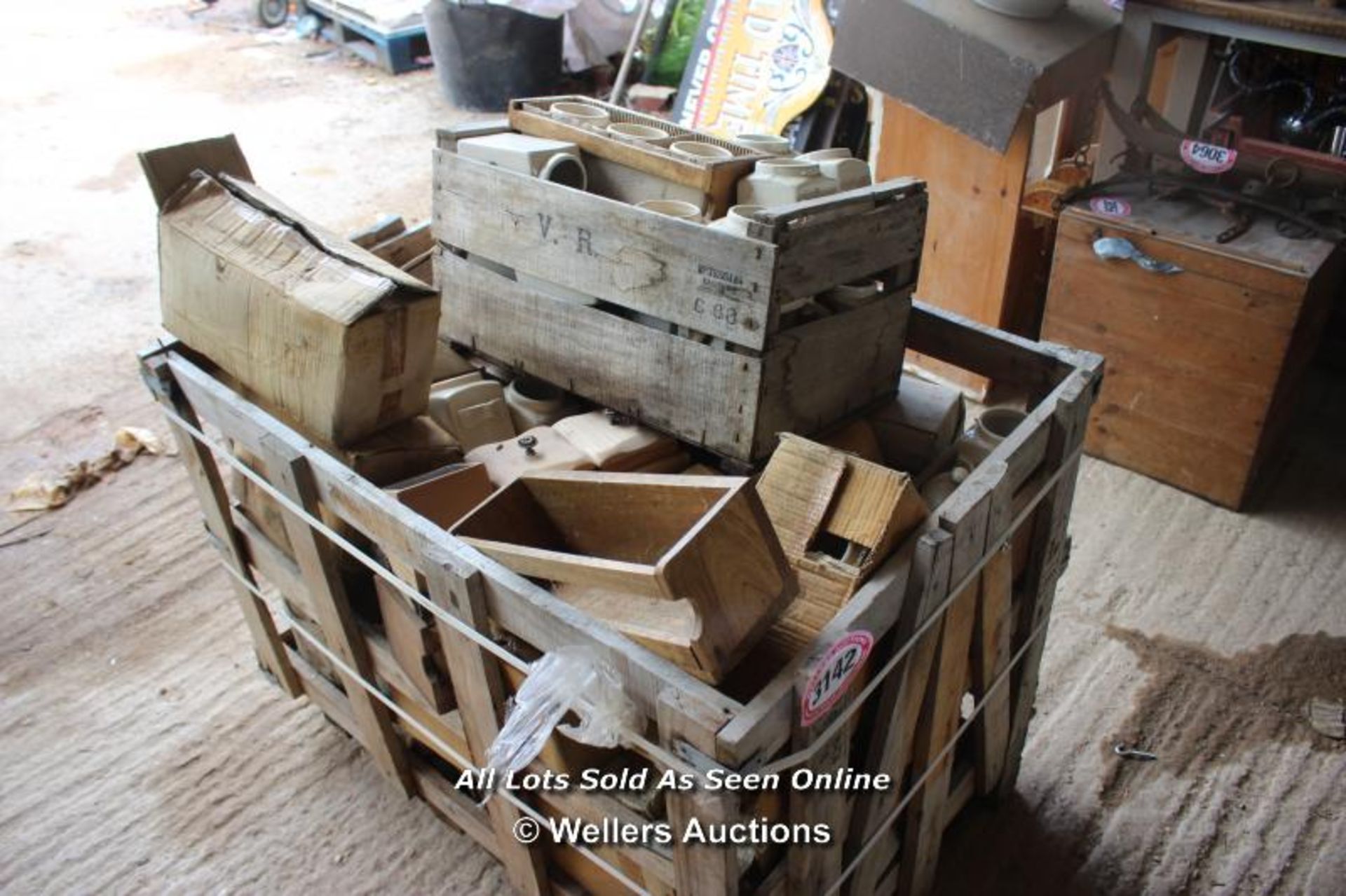 *CRATE CONTAINING VARIOUS COFFEE, TEA AND SUGAR CANISTERS, SOME ARE WOODEN AND SOME ARE PORCELAIN