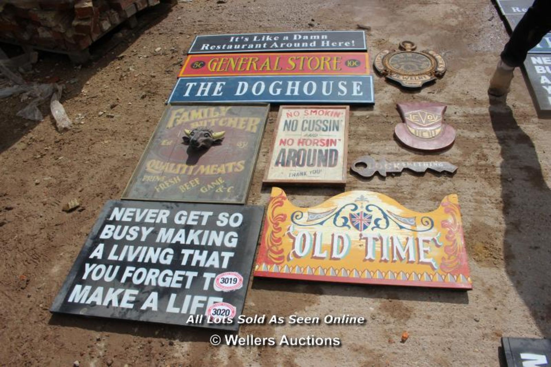 *TEN VARIOUS WOODEN SIGNS INCLUDING 'THE FAMILY BUTCHER' AND 'THE DOGHOUSE'