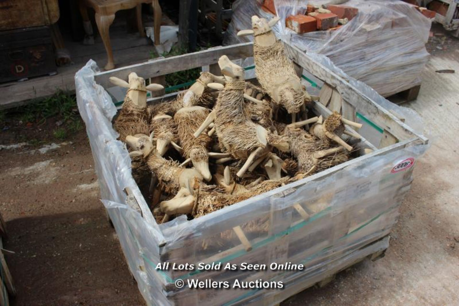 *PALLET OF APPROX 50 CARVED WOODEN SHEEP