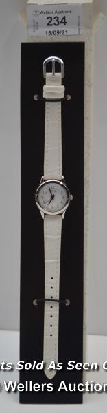 LADIES ,LIMIT,QUARTZ WATCH,WHITE ARABIC DIAL,STEEL CASE ,WHITE LEATHER STRAP / APPEARS TO BE NEW -