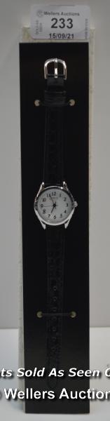 LADIES ,LIMIT,QUARTZ WATCH,WHITE ARABIC BATTON DIAL,STEEL CASE,BLACK LEATHER STRAP