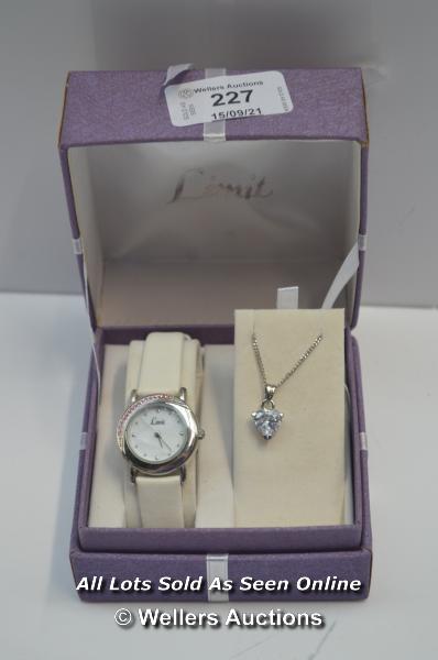 LADIES ,LIMIT,QUARTZ WATCH,WHITE BATTON DIAL,HALF STONE SET BEZEL,STEEL CASE,WHITE LEATHER STRAP