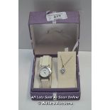 LADIES ,LIMIT,QUARTZ WATCH,WHITE BATTON DIAL,HALF STONE SET BEZEL,STEEL CASE,WHITE LEATHER STRAP