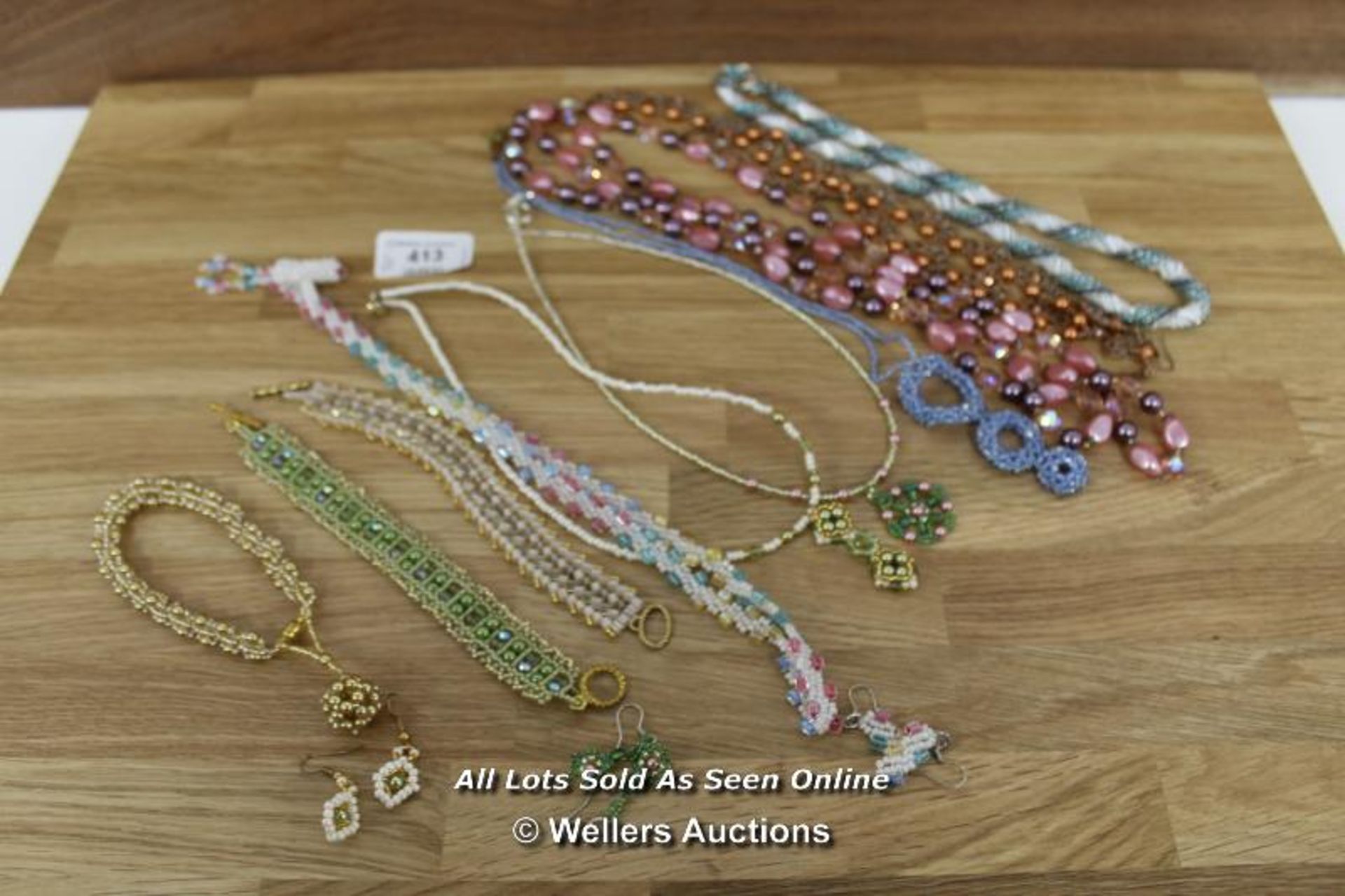 ASSORTED BEADED NECKLACES SOME WITH MATCHING EARINGS
