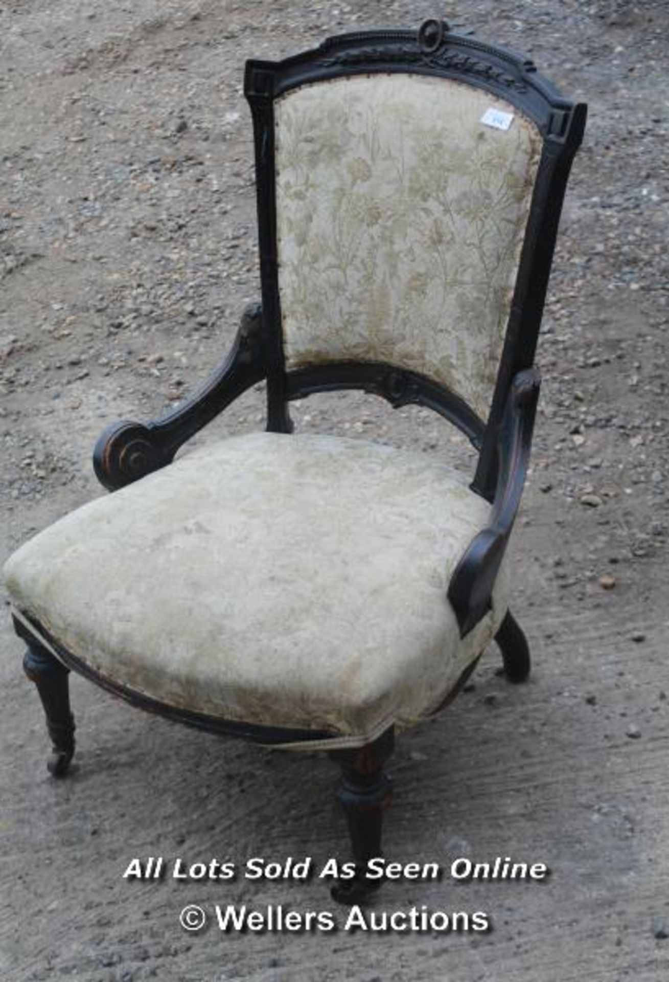 VICTORIAN CARVED NURSING CHAIR WITH TURNED FRONT LEGS AND CASTERS, 56CM WIDE, 56CM DEEP, SEAT 32CM