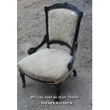 VICTORIAN CARVED NURSING CHAIR WITH TURNED FRONT LEGS AND CASTERS, 56CM WIDE, 56CM DEEP, SEAT 32CM