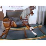 CARVED WOODEN ROCKING HORSE