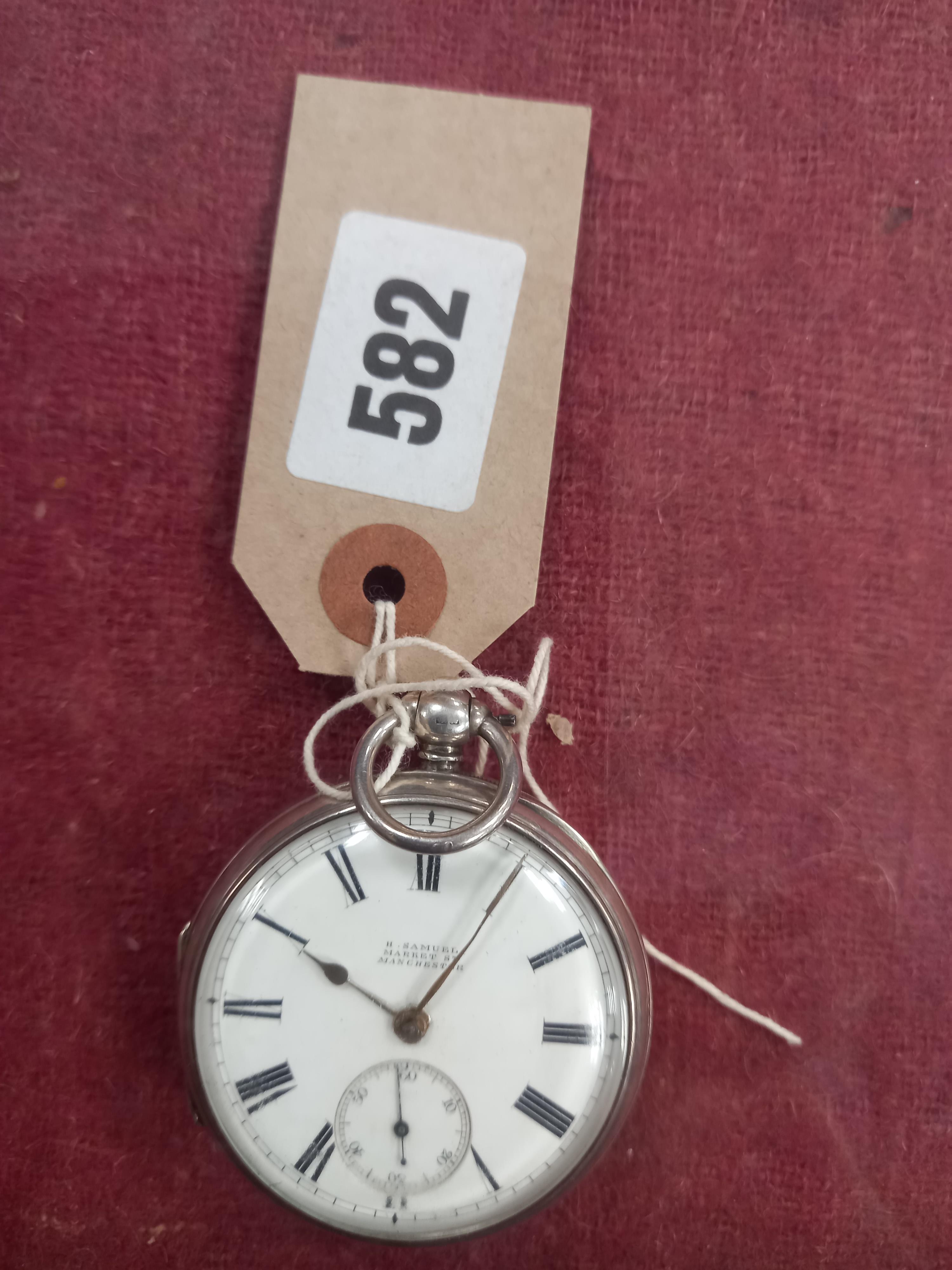 A SILVER CASED POCKET WATCH RETAILED BY