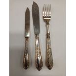 A SET OF 12 SILVER FISH KNIVES AND FORKS