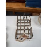 A PAIR OF SILVER ART DECO TOAST RACKS LO