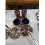 TWO OCTAGONAL SALTS WITH BLUE GLASS LINE