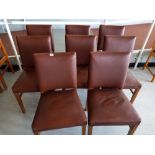 Eight Faux leather backed chairs