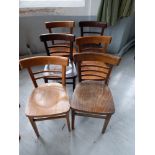 Six mixed light and dark stained beech chairs