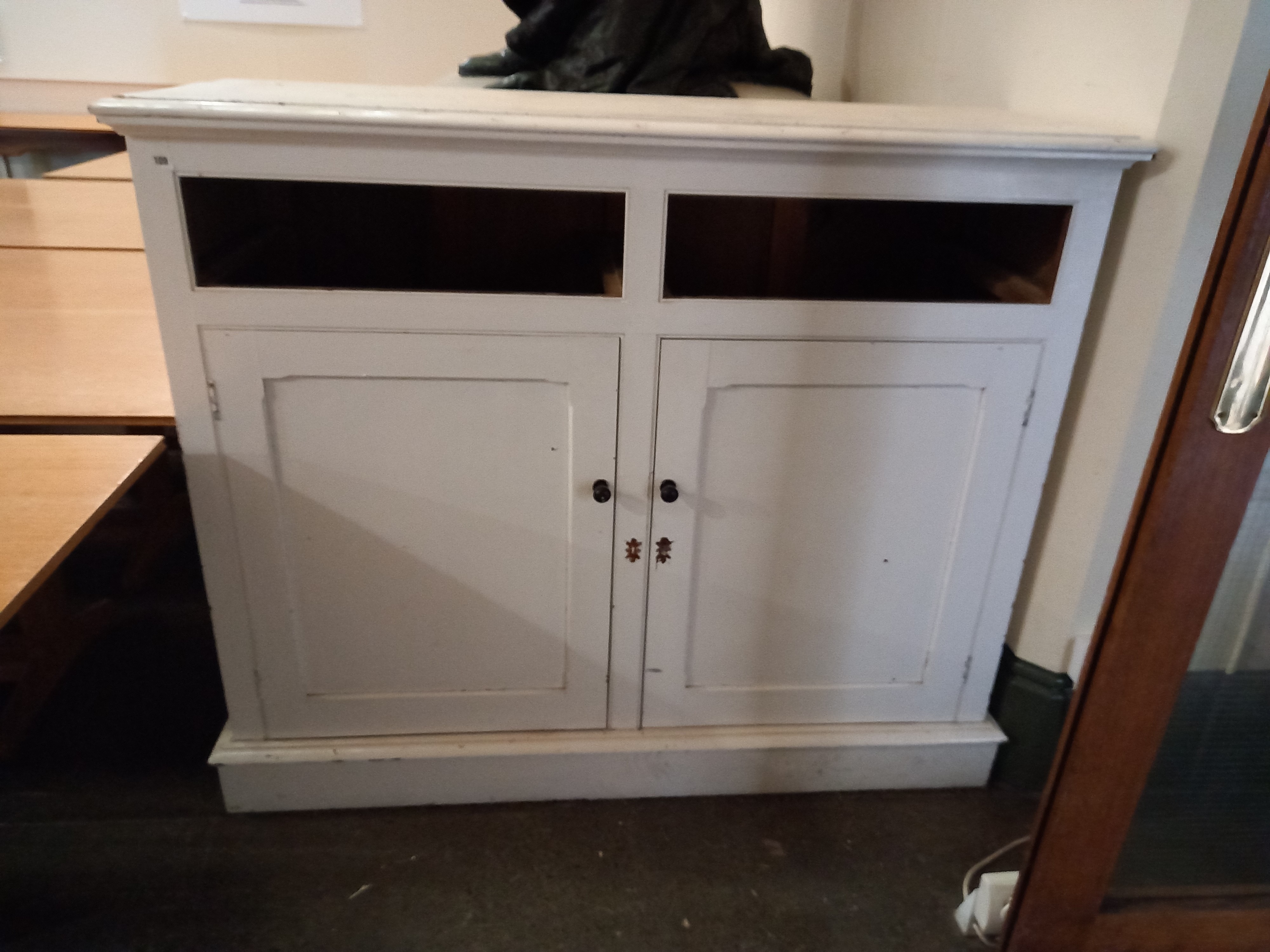 A Pine two door white painted cupboard