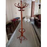 A reproduction bentwood coat stand 73" high