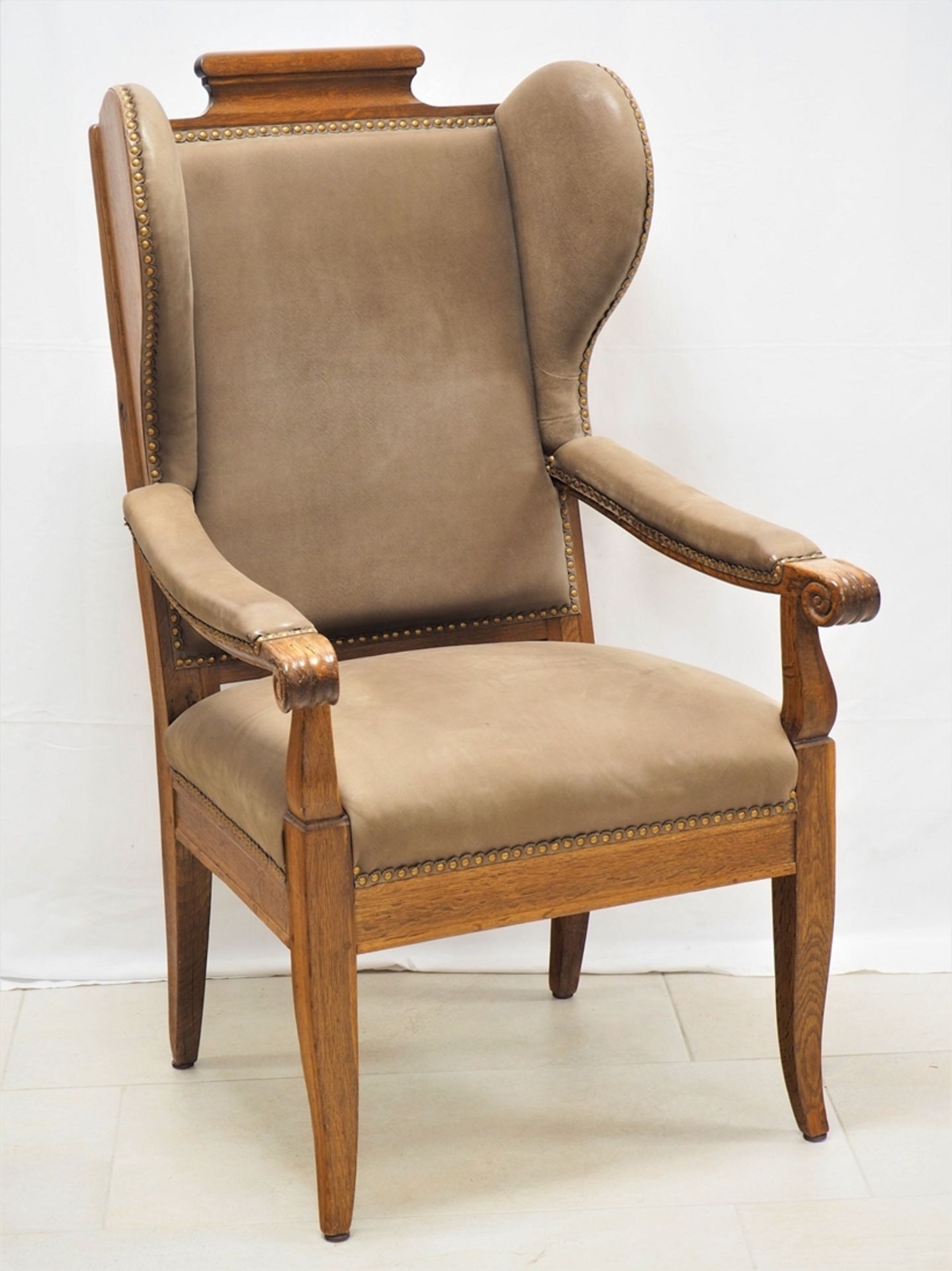 Late Biedermeier wing chair, oak.