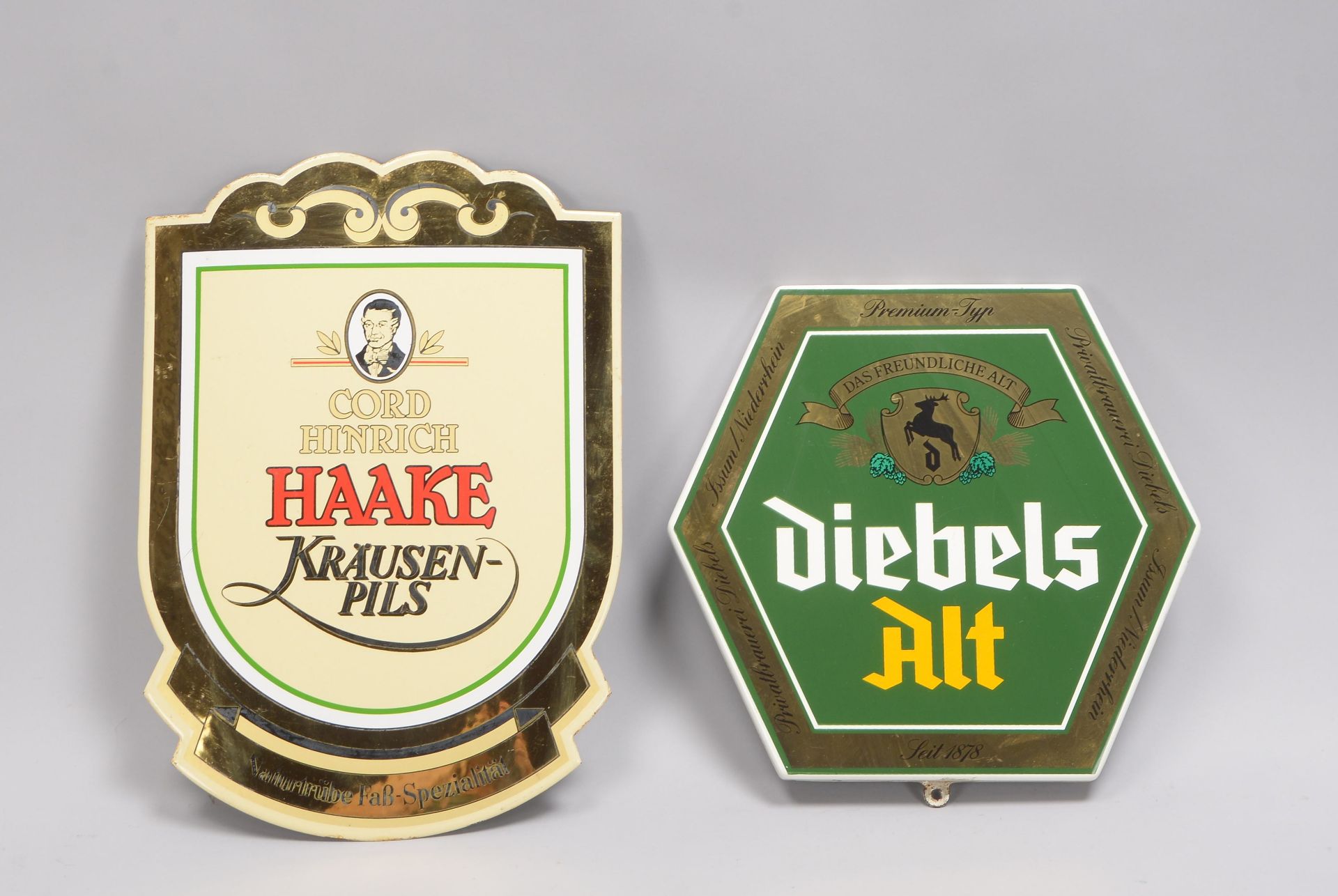 2 Sammler-Werbeschilder, Emaille: 1x &#039;Cord Hinrich Haake Kr&auml;usen-Pils&#039;, und 1x &#039;