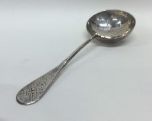 A Russian silver sifter spoon attractively decorat