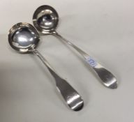 Two Scottish silver ladles of plain form. Approx.