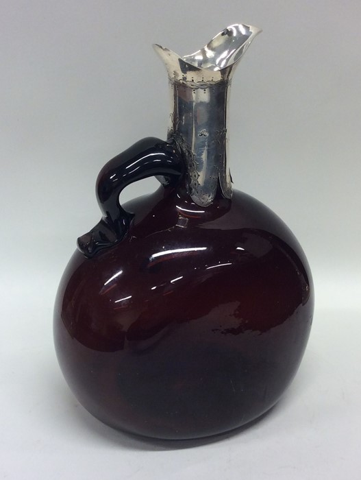 A heavy large Victorian red glass claret jug with - Image 2 of 2