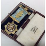 A cased 'Roll of Honor' medallion with enamelled