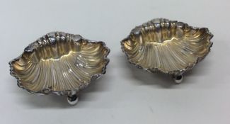 A good pair of small silver salts of fluted design