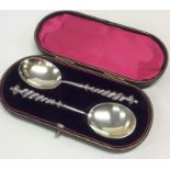 A good pair of silver plated preserve spoons conta