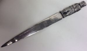 A large Continental silver paper knife in the form