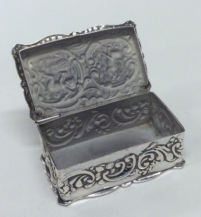 A chased rectangular silver box decorated with fig - Image 2 of 2