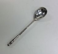 A Russian silver and Niello spoon on tapering stem