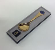 GEORG JENSEN: A silver gilt preserve spoon in fitt