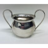 An Edwardian silver two handled sugar bowl. Birmin