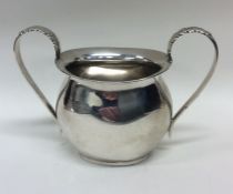 An Edwardian silver two handled sugar bowl. Birmin