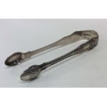 A good pair of heavy silver Kings' pattern tongs.