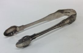 A good pair of heavy silver Kings' pattern tongs.