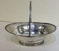 A Georgian silver sweet dish of oval form with bea