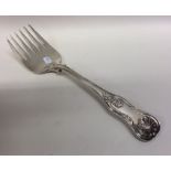 A heavy Kings' pattern silver serving fork. London